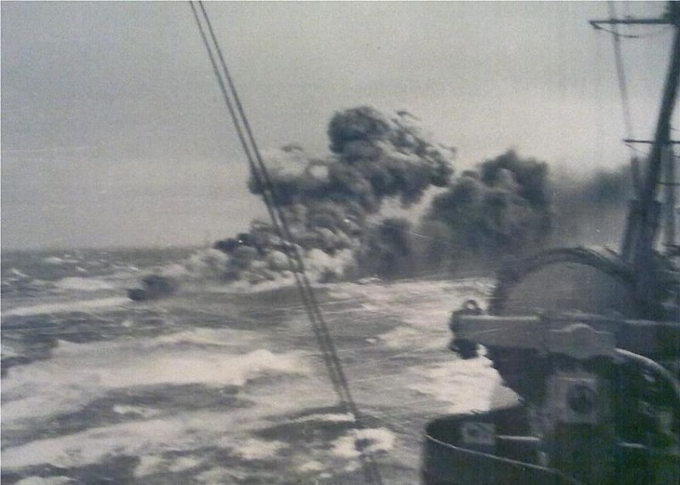 HMS Glowworm in flames after engaging the Admiral Hipper