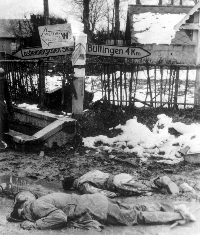 American soldiers lying dead and stripped of equipment in Honsfeld, Belgium, 17 December